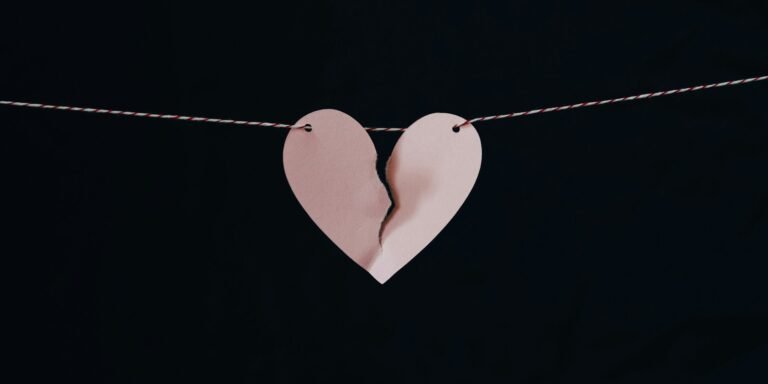 broken heart hanging on wire